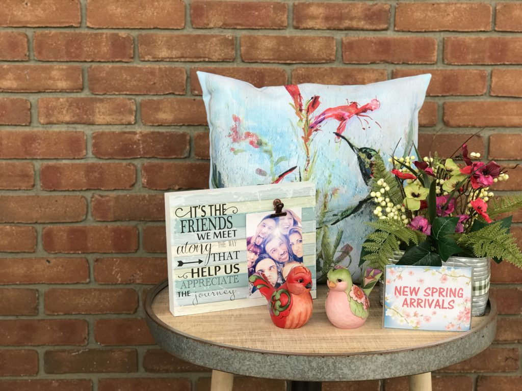 spring home decor including throw pillows in floral prints at Hartville Collectibles